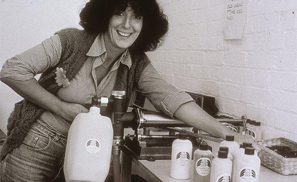 Anita Roddick filling bottles